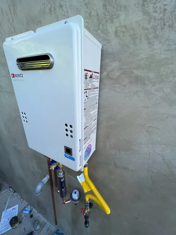 Tankless water heater installation for Day - Mar Village homes